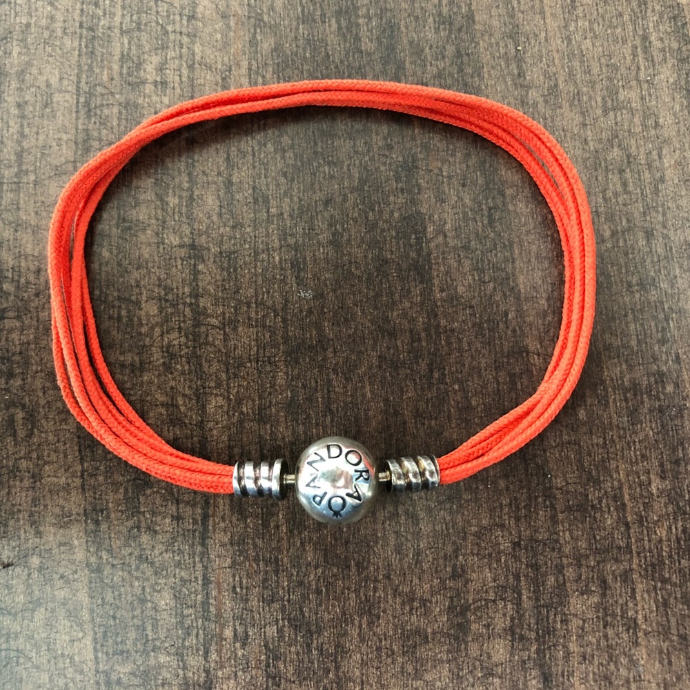 Pandora orange cord bracelet with sterling clasp
